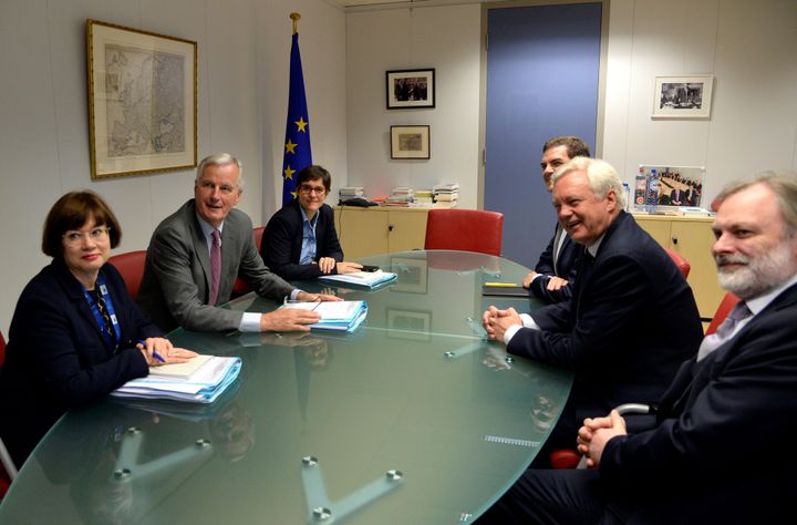 European Union's chief Brexit negotiator Michel Barnier and his delegation and Britain's Secretary of State for Exiting the European Union David Davis and his delegation attend a first full round of talks on Britain's divorce terms from the European Union