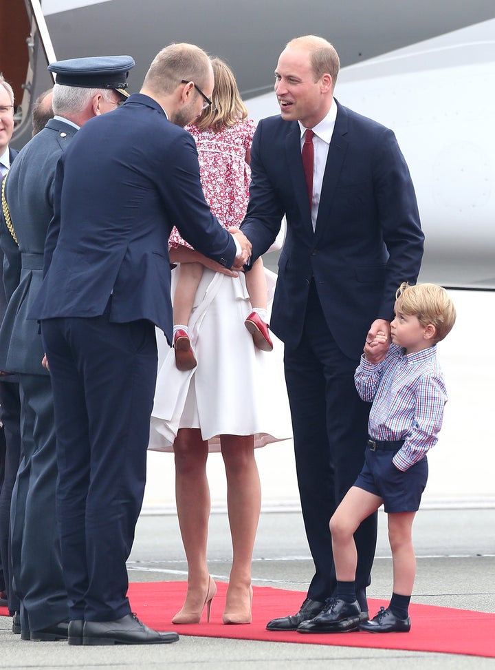 Wearing shoes just like dad's. 