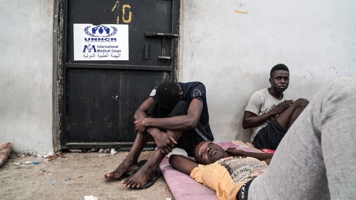 Illegal immigrants are held at a detention center in Zawiyah, Libya, on Monday.