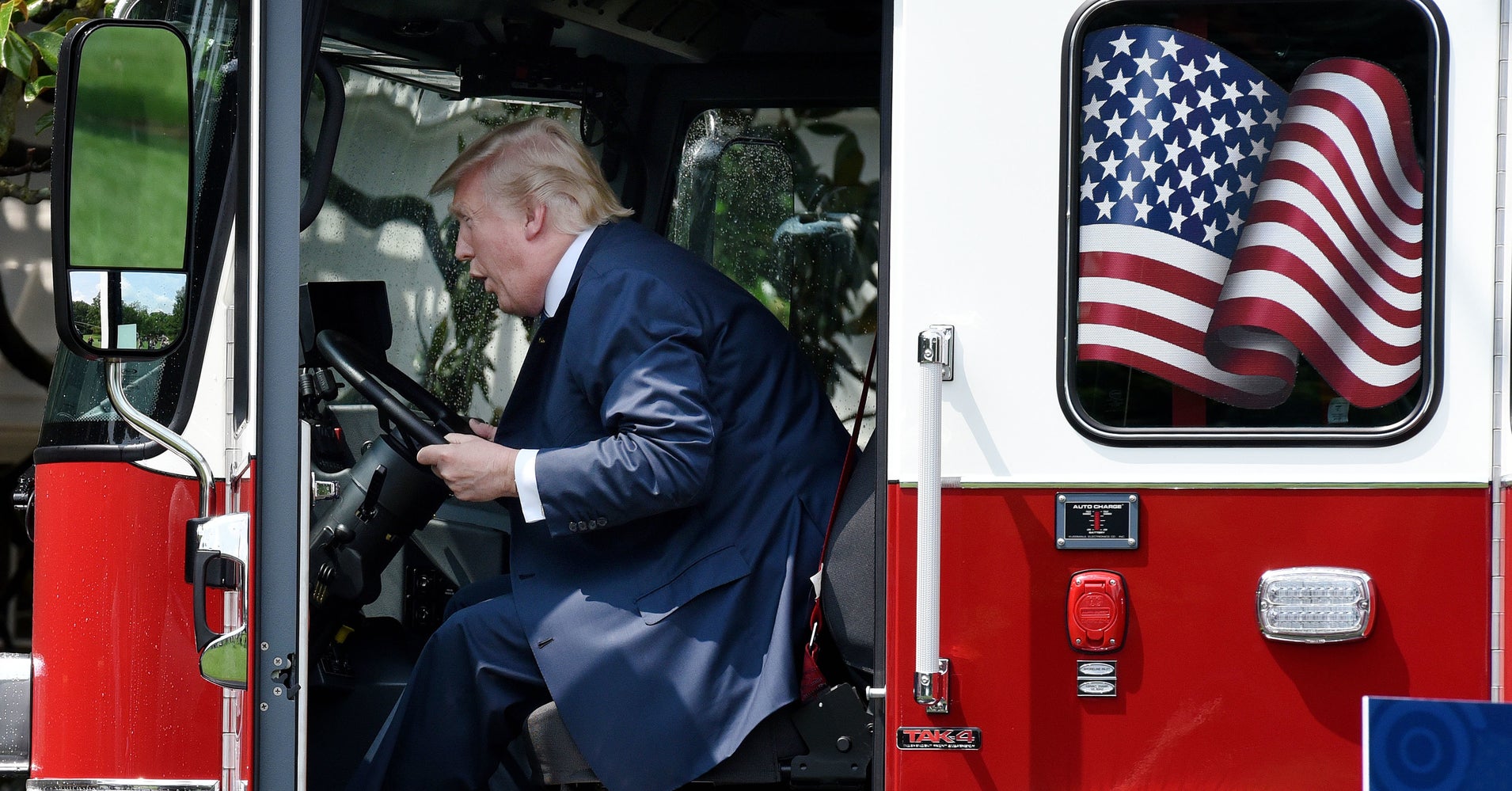 Image result for trump in a fire truck