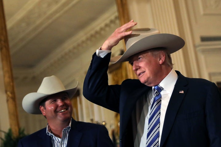 President Donald Trump wears a cowboy hat as he attends a "Made in America" products showcase event at the White House on Jul