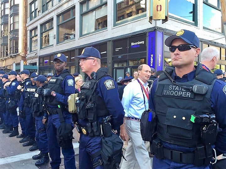 <p>Police create barrier between protestors and delegates outside the Republican National Convention in Cleveland, Ohio, in July 2016.</p>