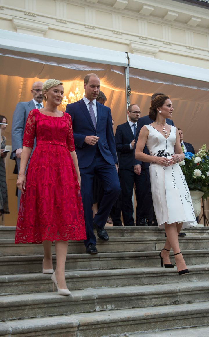 Prince William, Duke of Cambridge, Catherine, Duchess of Cambridge and Poland's First Lady Agata Kornhauser-Duda attend the Queen's Birthday Garden Party at the Orangery, Lazienki Park on day one of their official visit to Poland on 17 July 2017 in Warsaw, Poland.