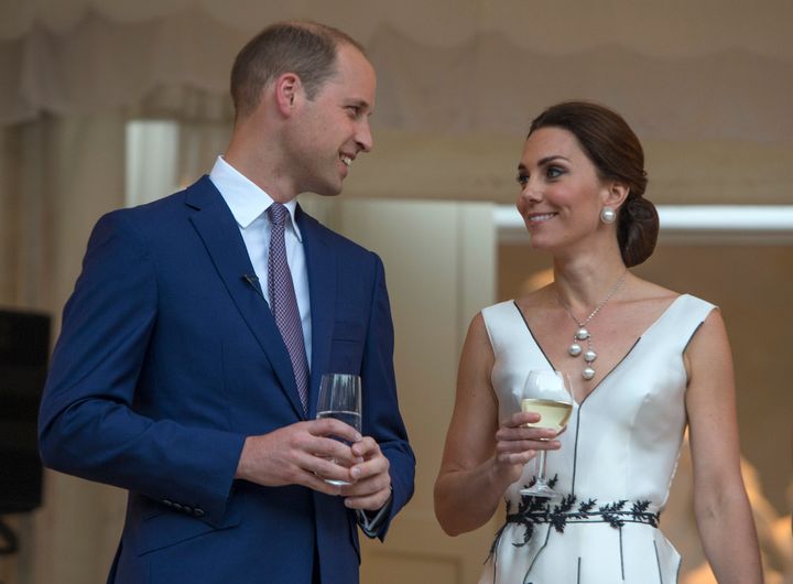 Prince William, Duke of Cambridge and Catherine, Duchess of Cambridge prepare to toast HM The Queen at the Queen's Birthday Garden Party at the Orangery, Lazienki Park on day 1 of their official visit to Poland on July 17, 2017 in Warsaw, Poland.