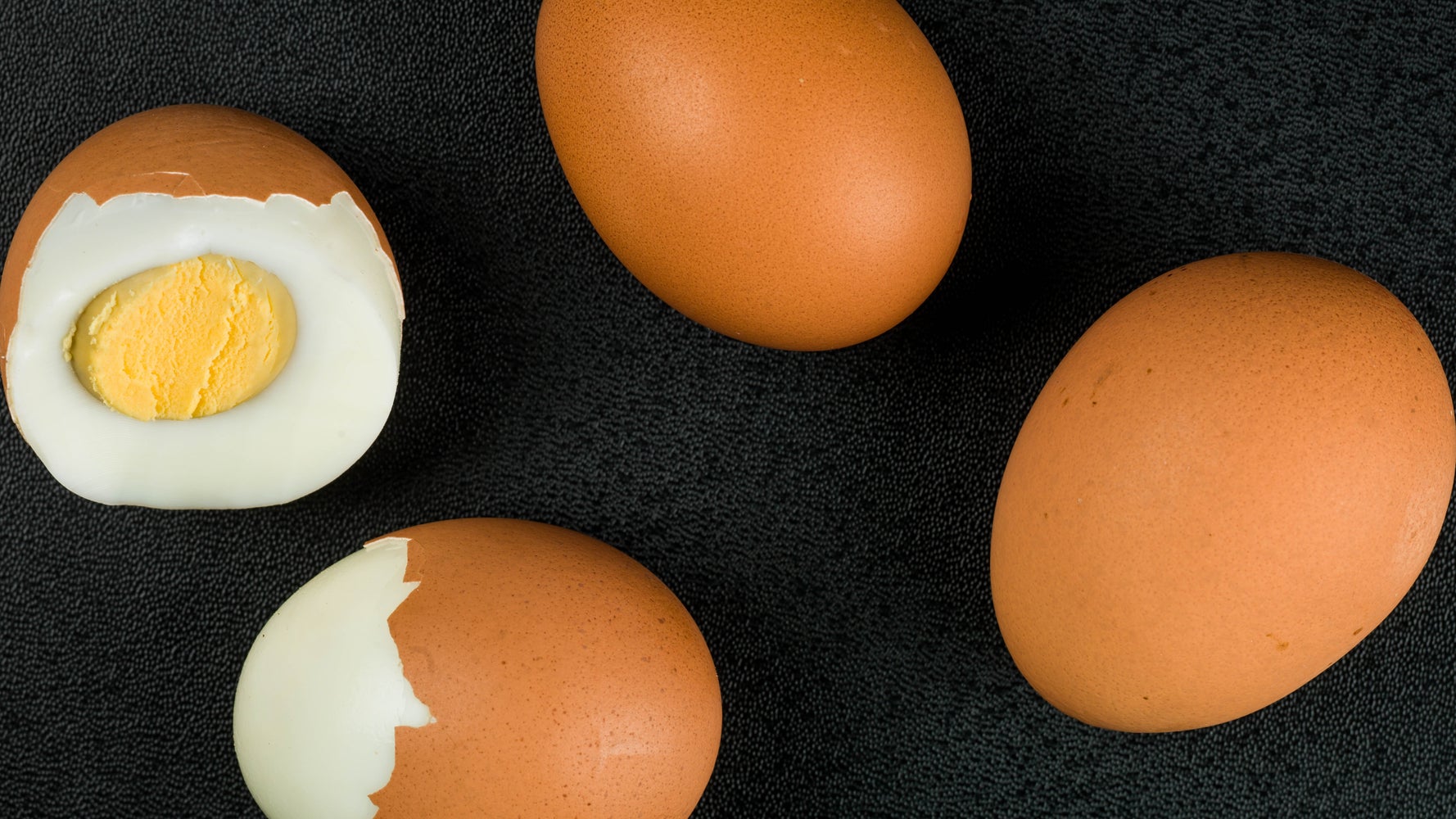 Two white and brown eggs art, Peeled Hard Boiled Eggs transparent