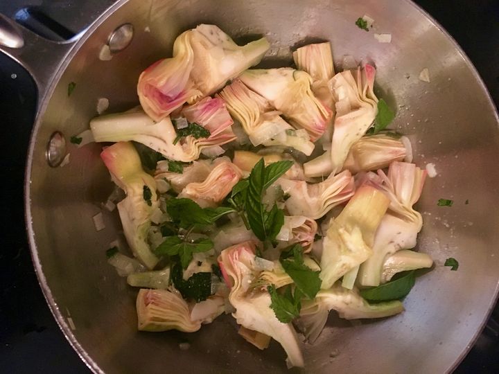 Small artichokes, trimmed and quartered, and fresh mint
