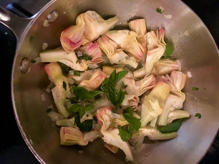 <p>Small artichokes, trimmed and quartered, and fresh mint</p>