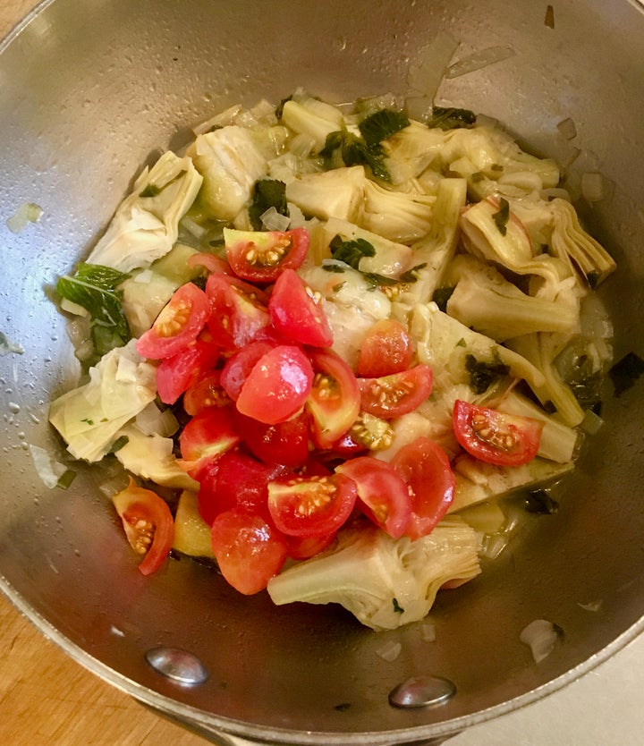 <p>Five or six cherry tomatoes, peeled and quartered</p>