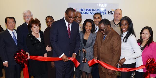 <p>Helen Callier, Bradlink President in white shirt celebrating the opening of Houston MBDA Center. </p>