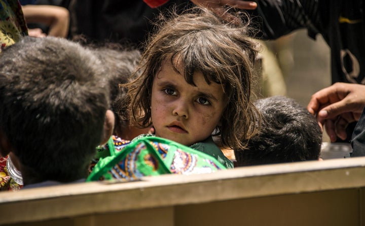 Iraqi children who fled fighting in Mosul on the city's western edge. July 8.