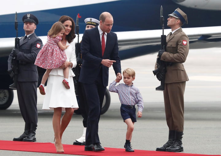 Prince William, the Duke of Cambridge, his wife Catherine, The Duchess of Cambridge, Prince George and Princess Charlotte arrive at a military airport in Warsaw, Poland on July 17. 