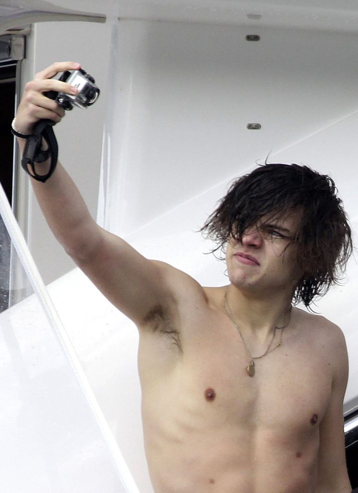 Harry Styles snapping some sweet nipple selfies on a boat in Australia in 2012.