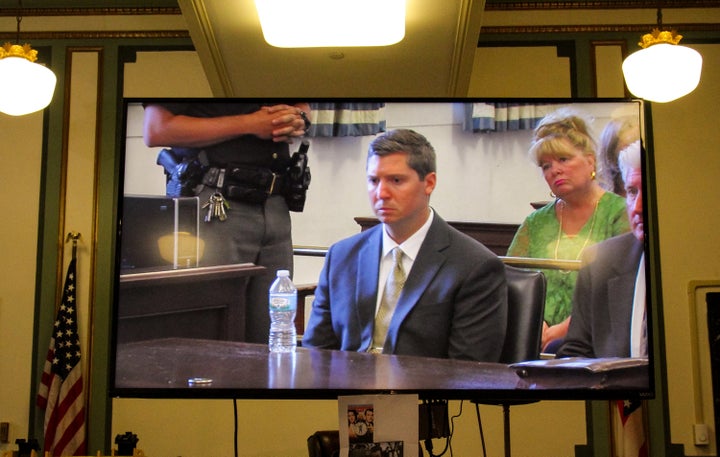 A screen show former University of Cincinnati police officer Ray Tensing listening as the judge declares a mistrial after jury deadlocks ending the retrial in death of Samuel DuBose in Cincinnati, Ohio, U.S. June 23, 2017. (REUTERS/William Philpott)