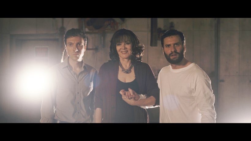 Jake (left) and Adam with their beaming Mom Evette in <em>Shadowman</em>.