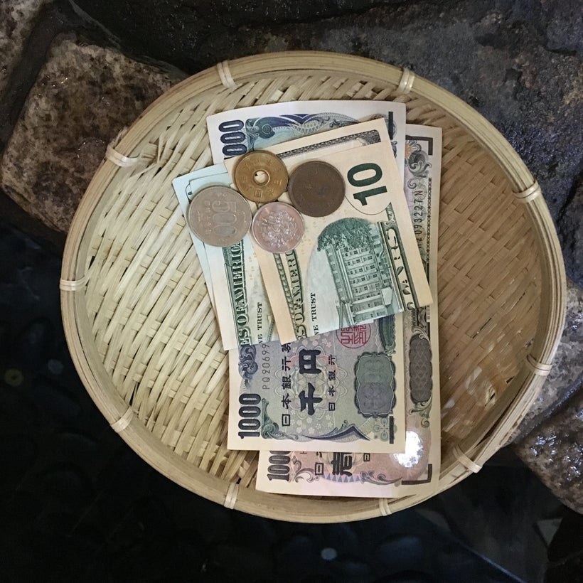 Put whatever amount you choose, bills or coins, in the basket.