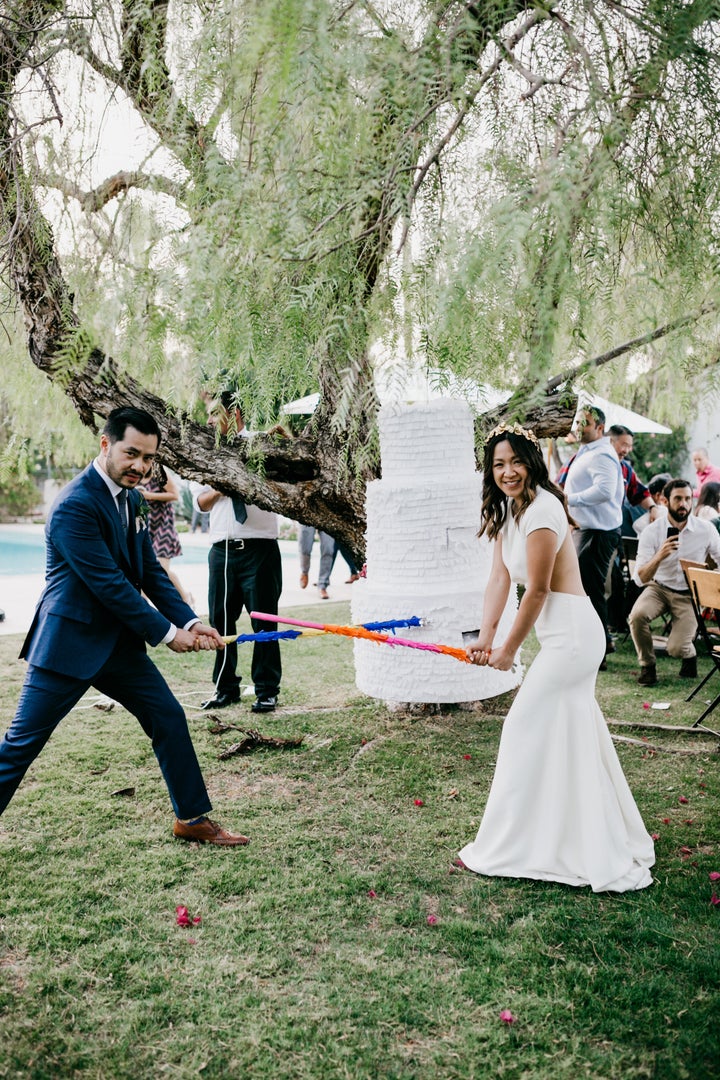 The bride and groom had their game faces on when they tied the knot at La Chureya Estate in Palm Springs. 