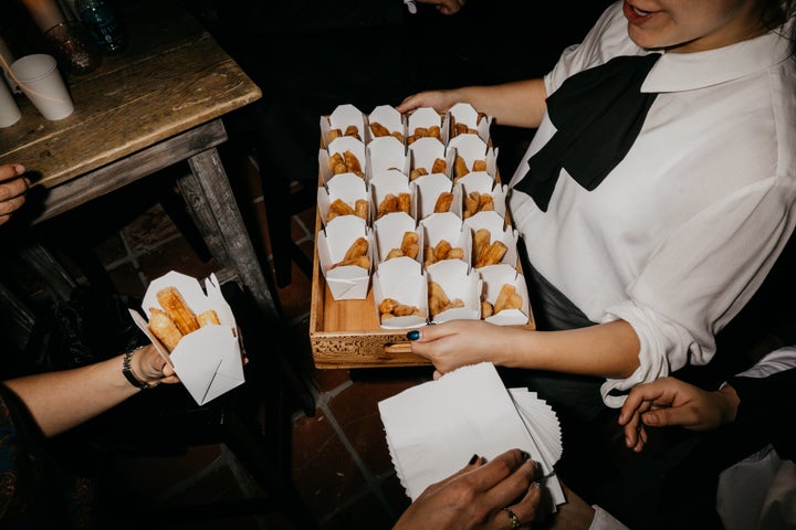 Churros were served for dessert. 