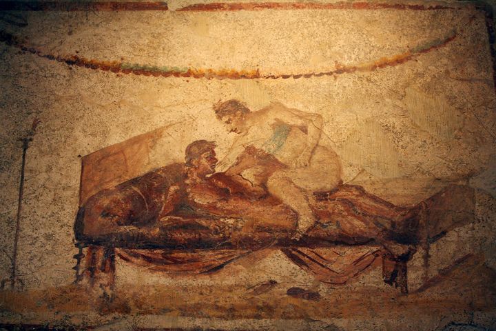 Picture taken 26 October 2006 of an erotic fresco in Pompeii. Art officials have restored an ancient brothel in the archaeological complex of Pompeii, believed to be the most popular one in the ancient Roman city. 