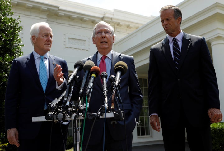 Senate Majority Leader Mitch McConnnell and Senate Majority Whip John Cornyn and South Dakota Senator John Thune speak to reporters after U.S. President Donald Trump's meeting with Senate Republicans to discuss health care at the White House, July 19, 2017.