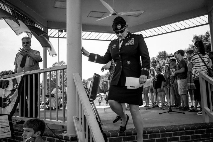 Lt. Col. Alicia Masson, the former commander of the Army base in Radford, exits the stage after giving the keynote address at a Memorial Day celebration in Bisset Park on the New River.