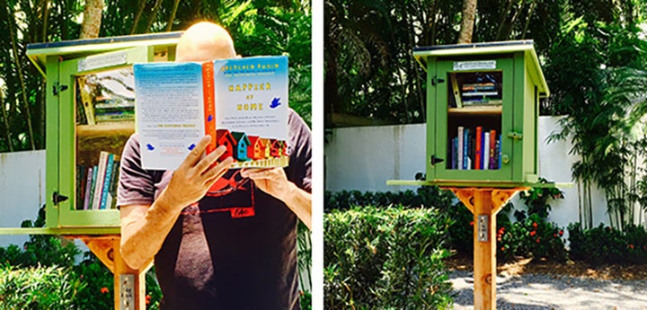 <p>That’s my head popping out of a book at a local free library box.</p>