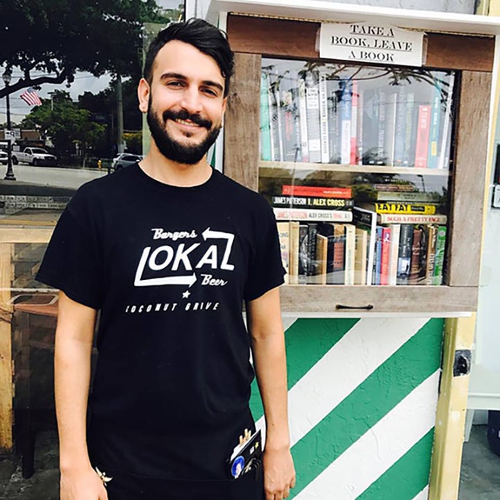 A local restaurant has a little library box right outside their door.