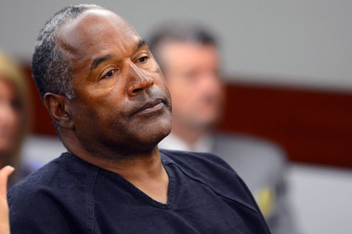 O.J. Simpson watches his former defense attorney testify during an evidentiary hearing in Clark County District Court on May 17, 2013.