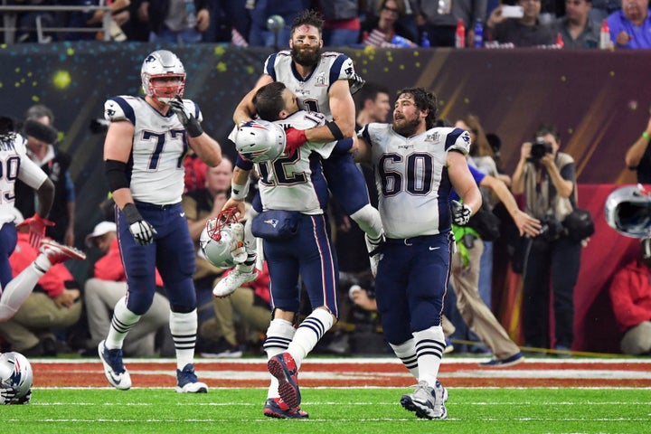 Julian Edelman is pictured celebrating the New England Patriots' win over the Atlanta Falcons with his teammates at Super Bow