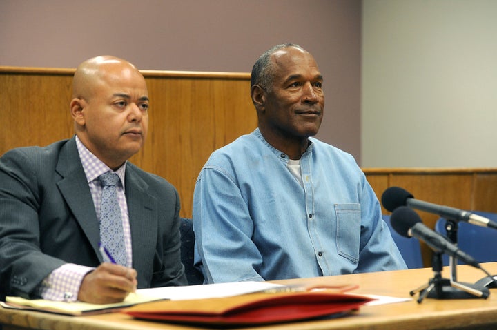 O.J. Simpson sits with his lawyer during his parole hearing on Thursday.