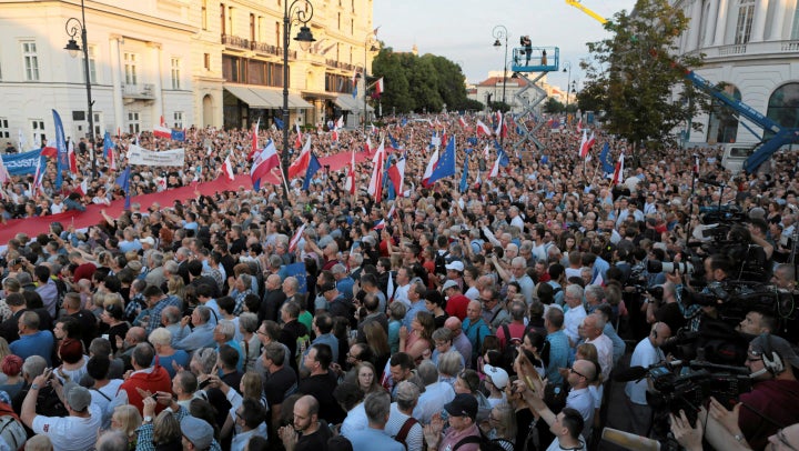 People protest against the proposed judicial legislation in Warsaw on July 20.