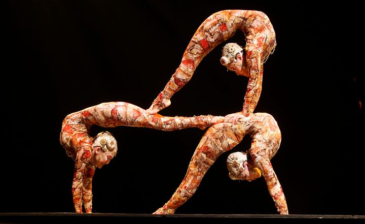 Contortion artists perform during the Cirque du Soleil's Kooza show in Madrid.