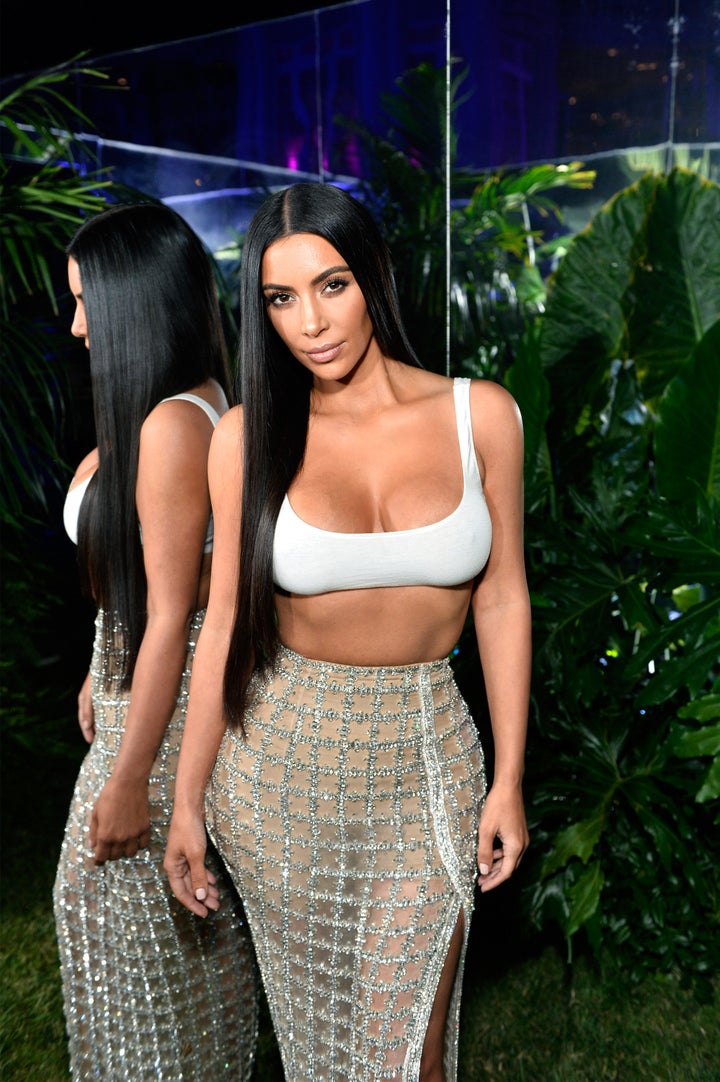 Kim K. Pairs A Crop Top With A Gorgeous Sheer Skirt Because Of