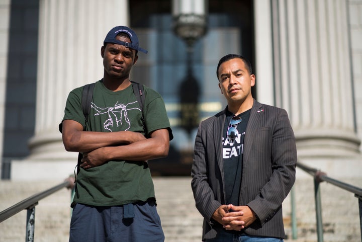 Attorney Cesar Vargas, right, the first openly undocumented attorney in New York, with his client Ivan Ruiz in Manhattan.