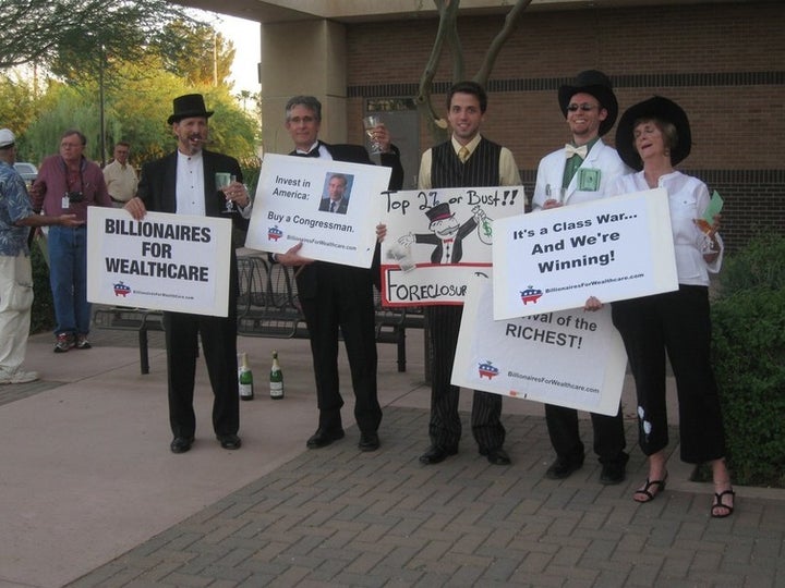 Wealthy allies advocate for policies at odds with the goals touted by the satirical group Billionaires for Wealthcare. (<a re
