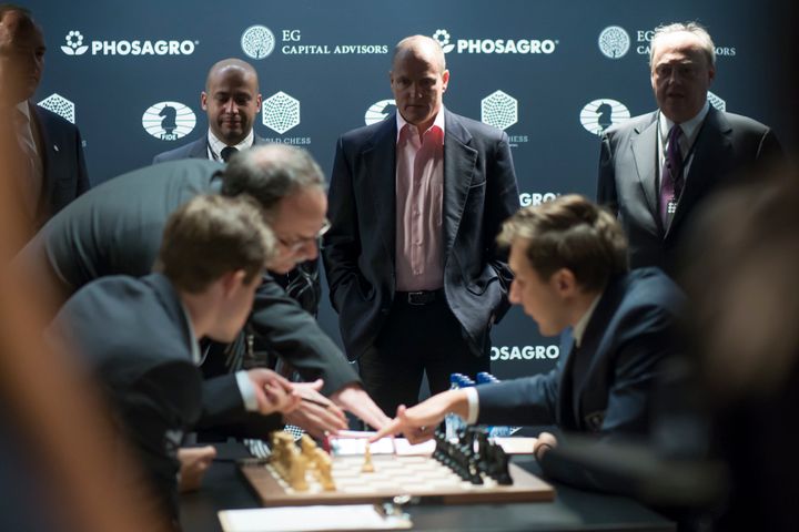 Woody Harrelson watches the opening moves of the world chess championship in New York