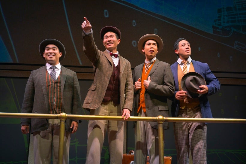 Phil Wong (Frank), James Seol (Henry), Sean Fenton (Fred), and Hansel Tan (Charlie) in a scene from <strong><em>The Four Immi