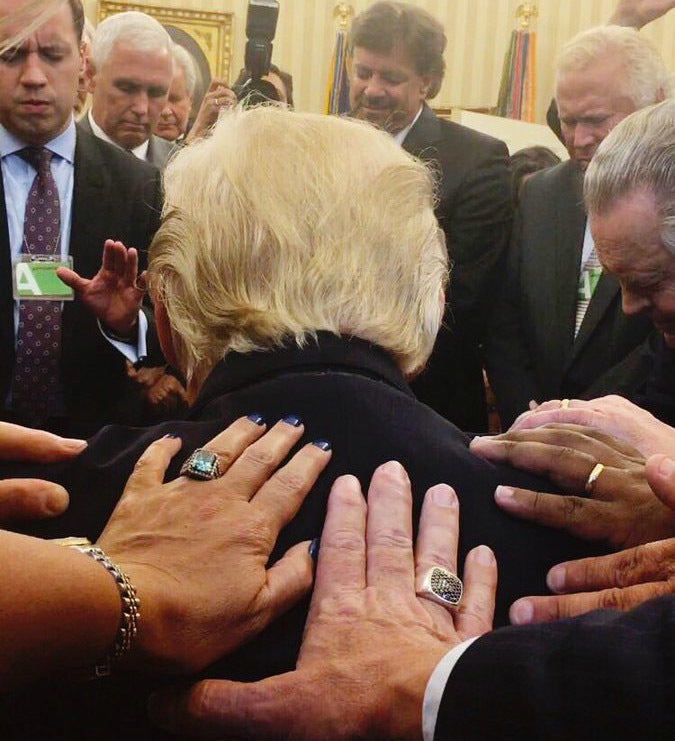 Christian ministers “lay hands on” and pray for Donald Trump last week at the White House