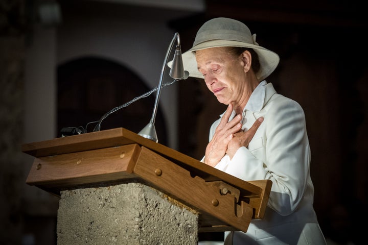 Marcelline Udry, one of the daughters of the late Marcelin and Francine Dumoulin, is seen during Saturday's funeral. 