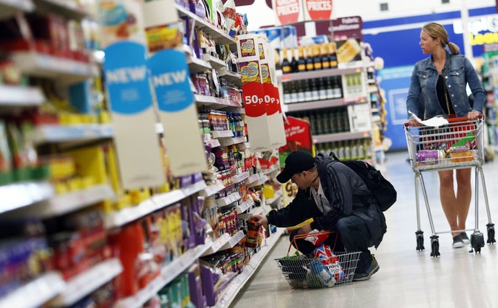 Consumer spending has been hit by higher inflation, an influential survey found on Monday