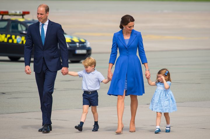 Prince William, pictured with wife Catherine and their children Charlotte and George 