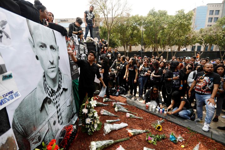 Fans around the world have left floral tributes in various places, including these ones at Mexico City's Revolucion monument