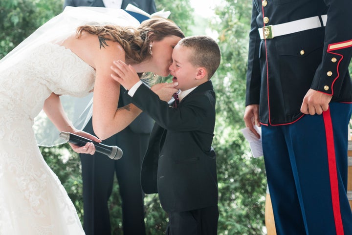 The bride and groom consoled Gage. 