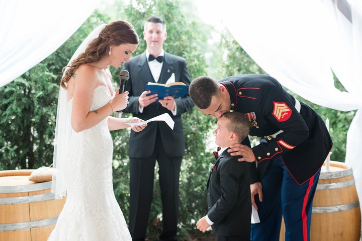 The newlyweds are both on active duty -- the bride is a senior airman in the Air Force and the groom is a sergeant in the Marines.