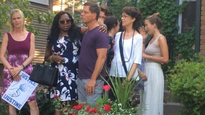 Valerie Castile, mother of Philando Castile, embraces Don Damond, fiancé of Justine Damond. Philando Castile was shot and kil