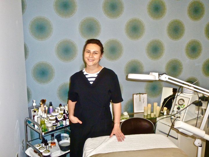 An esthetician at the swank Eména Spa in the Fashionable Design District. 