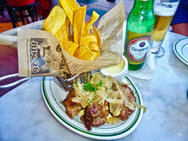 Start your meal with the succulent Masitas de Puerco and a Presidente beer at the Havana 1957 restaurant.