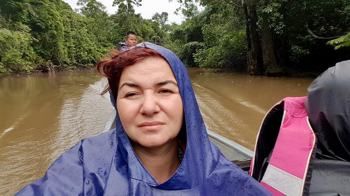 <p>Having a FML moment under the strong rain, during a 2 hours long boat ride, in Amazonian Rain Forest.</p>