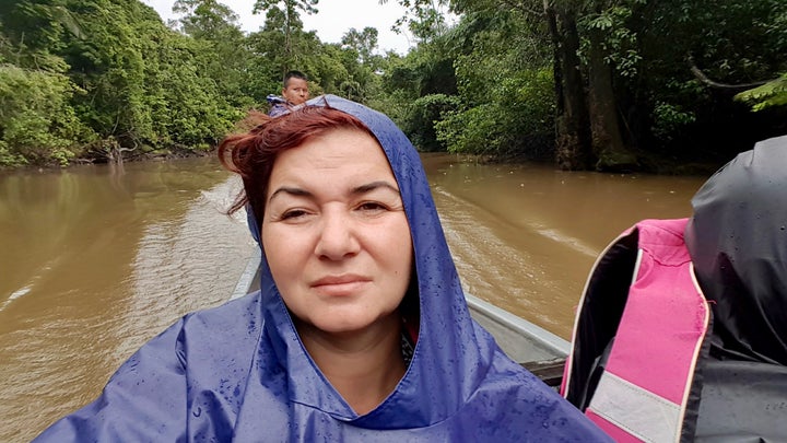 Having a FML moment under the strong rain, during a 2 hours long boat ride, in Amazonian Rain Forest.