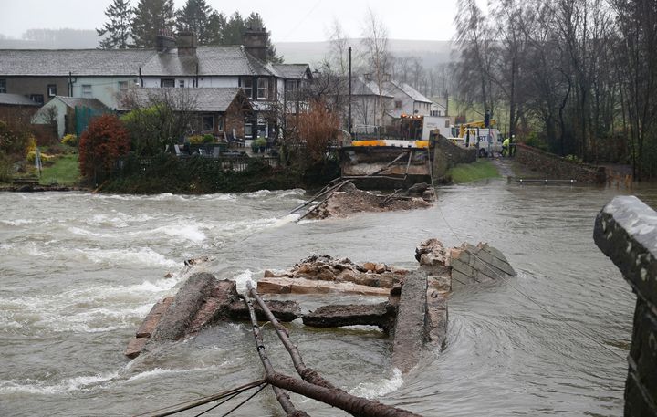 The clear up at Pooley Bridge in Ullswater, Cumbria after it was washed away by high water caused by Storm Desmond