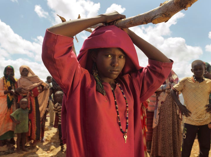 May 2017, Baidoa, Somalia. Fadumo Nunow Abdillow, 15, at Muuri displacement camp, Baidoa District, Somalia. In Baidoa, at least 155,000 Somalis have been displaced from their homes because of drought and instability and they are residing in temporary huts. Mercy Corps is providing 30,000 liters of clean water daily to three camps in Baidoa. 